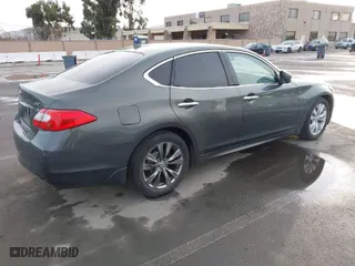 2013 Infiniti M37 with VIN JN1BY1AP8DM513615, listed as a IAAI auction lot 41572602 with 96,950 mi miles. Bid and sale history available at carsss.com. Image 4.