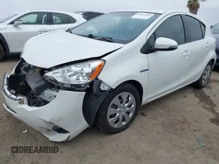 2013 Toyota Prius One with VIN JTDKDTB32D1542013, listed as a IAAI auction lot 41902051 with 134,582 mi miles and . Bid and sale history available at DreamBid. Image 2.