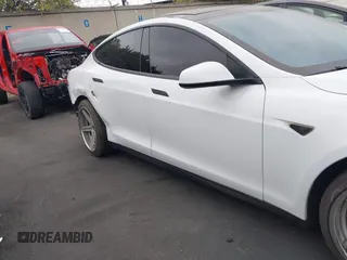 2013 Tesla Model S with VIN 5YJSA1CN1DFP07344, listed as a IAAI auction lot 42746574 with 181,538 mi miles and . Bid and sale history available at DreamBid. Image 13.