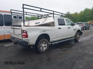 2015 Ram 2500 Tradesman z VIN 3C6UR5CJXFG500994, wystawiony jako IAAI lot #42269164 z przebiegiem 154 666 mil mil oraz . Historia ofert i sprzedaży dostępna na DreamBid. Obrazek 4.
