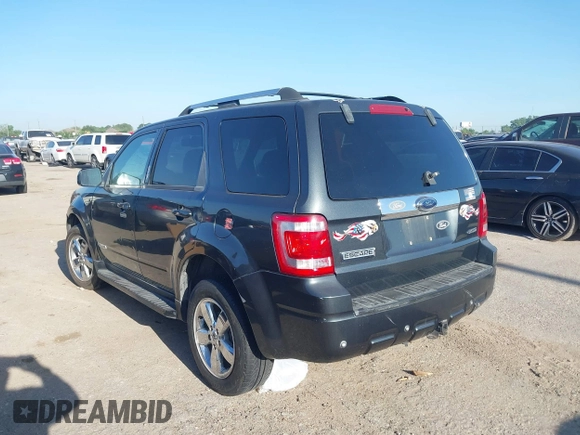 2008 Ford Escape Limited with VIN 1FMCU94188KE48829, listed as a IAAI auction lot 41980759 with 214,466 mi miles. Bid and sale history available at carsss.com. Image 3.