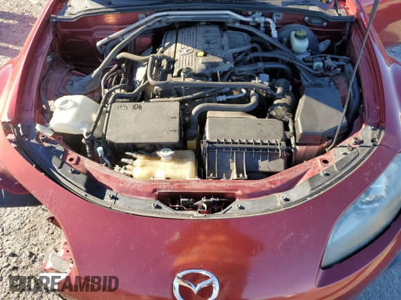 2015 Mazda MX-5 Miata Grand Touring z VIN JM1NC2PF8F0240280, wystawiony jako Copart lot #41663955 z przebiegiem 101 754 mil mil oraz Szkoda całkowita • Salvage title. Historia ofert i sprzedaży dostępna na DreamBid. Obrazek 11.