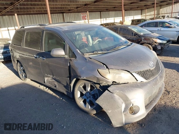 2014 Toyota Sienna SE with VIN 5TDXK3DC1ES462473, listed as a IAAI auction lot 41811437 with 209,704 mi miles and . Bid and sale history available at DreamBid. Image 1.