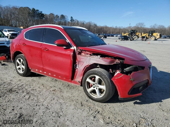 2018 Alfa Romeo Stelvio with VIN ZASFAKANXJ7B89561, listed as a Copart auction lot 42215045 with 82,946 mi miles and Salvage Title. Bid and sale history available at carsss.com. Image 4.