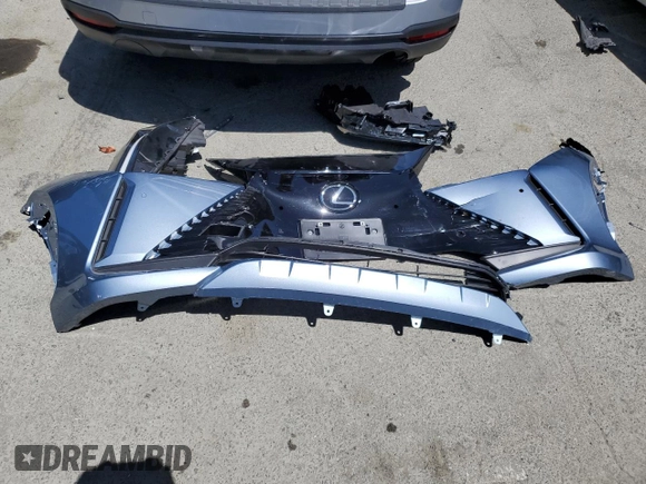2023 Lexus RZ 450e Premium z VIN JTJAAAAB3PA000731, wystawiony jako Copart lot #57350214 z przebiegiem 7 642 mil mil oraz Szkoda całkowita • Salvage title. Historia ofert i sprzedaży dostępna na DreamBid. Obrazek 13.