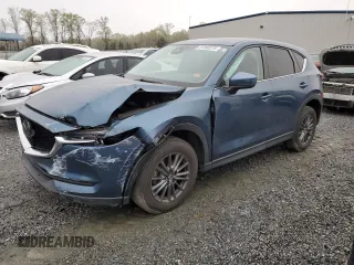2017 Mazda CX-5 Touring with VIN JM3KFBCLXH0124451, listed as a Copart auction lot 51060275 with 126,807 mi miles and Salvage Title. Bid and sale history available at carsss.com. Image 1.