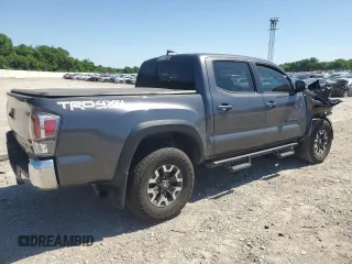 2023 Toyota Tacoma SR with VIN 3TYCZ5AN9PT131515, listed as a Copart auction lot 57900865 with Not provided miles and Salvage title. Bid and sale history available at DreamBid. Image 3.