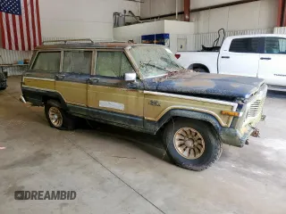 1986 Jeep Grand Wagoneer с VIN 1JCNJ15U5GT147524, выставлен на аукционе Copart как лот 57421255 с пробегом 112 292 миль миль и Списание • Salvage title. История ставок и продаж доступна на DreamBid. Изображение 4.