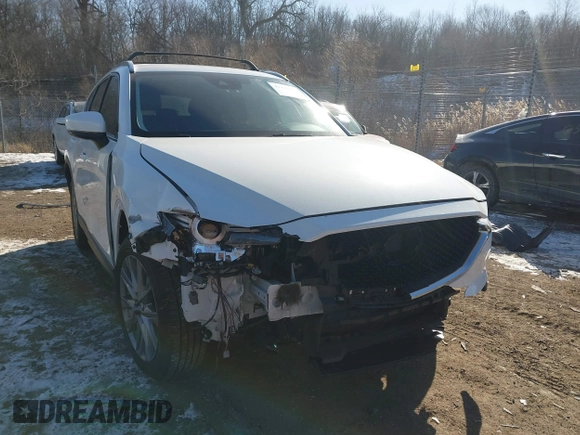 2020 Mazda CX-5 Grand Touring with VIN JM3KFADM5L1815374, listed as a IAAI auction lot 41416077 with 44,190 mi miles. Bid and sale history available at carsss.com. Image 1.