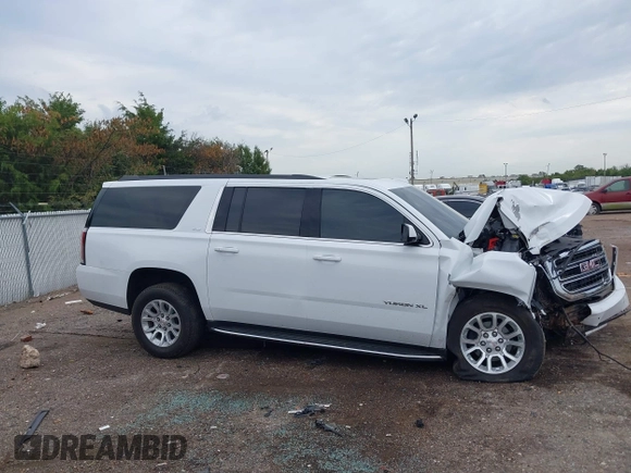 2019 GMC Yukon XL SLT with VIN 1GKS2GKC2KR369285, listed as a IAAI auction lot 40279008 with Not Provided miles and . Bid and sale history available at DreamBid. Image 13.