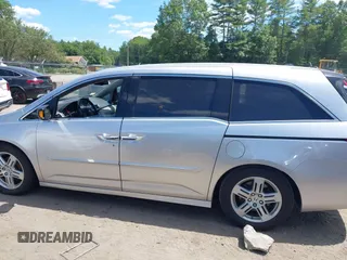 2012 Honda Odyssey Touring with VIN 5FNRL5H9XCB026741, listed as a IAAI auction lot 42808245 with 293,422 mi miles and . Bid and sale history available at DreamBid. Image 14.