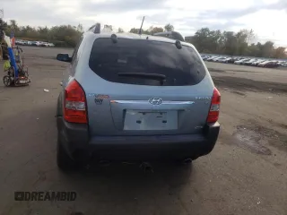 2005 Hyundai Tucson GLS with VIN KM8JN72D75U080052, listed as a Copart auction lot 75173014 with 106,479 mi miles and Salvage Title. Bid and sale history available at carsss.com. Image 6.