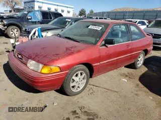 1996 Ford Escort z VIN 1FASP11J0TW138176, wystawiony jako Copart lot #82435494 z przebiegiem 62 107 mil mil oraz Tytuł czysty. Historia ofert i sprzedaży dostępna na DreamBid. Obrazek 1.