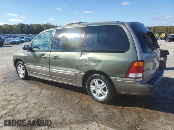 2002 Ford Windstar SEL with VIN 2FMDA53432BB05185, listed as a Copart auction lot 80389234 with 166,397 mi miles and Salvage title. Bid and sale history available at DreamBid. Image 2.