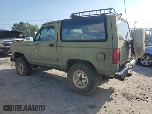 1987 Ford Bronco z VIN 1FMCU14T6HUC98971, wystawiony jako Copart lot #69262784 z przebiegiem 49 522 mil mil oraz Czysty tytuł • Clean title. Historia ofert i sprzedaży dostępna na DreamBid. Obrazek 2.