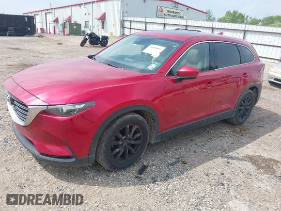 2016 Mazda CX-9 Touring z VIN JM3TCACY0G0101617, wystawiony jako IAAI lot #41850485 z przebiegiem 292 880 mil mil oraz . Historia ofert i sprzedaży dostępna na DreamBid. Obrazek 23.