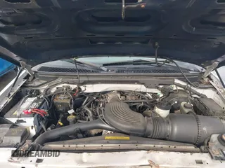 2000 Ford F-150 XL z VIN 1FTRX18L8YKA72409, wystawiony jako IAAI lot #41928360 z przebiegiem 167 251 mil mil oraz . Historia ofert i sprzedaży dostępna na DreamBid. Obrazek 10.