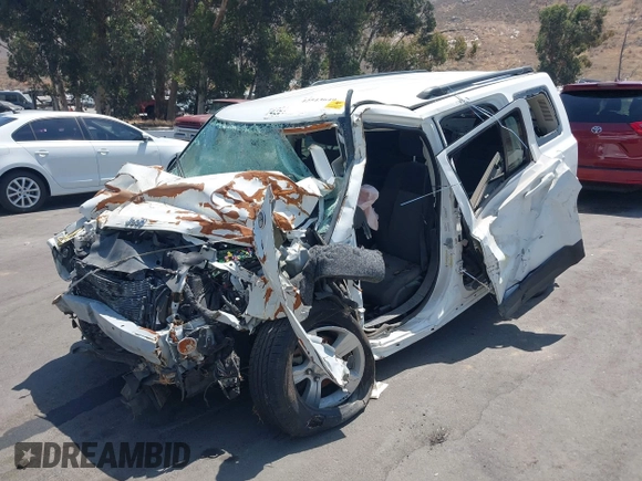 2014 Jeep Patriot Latitude with VIN 1C4NJRFB4ED549734, listed as a IAAI auction lot 42543649 with Not provided miles and . Bid and sale history available at DreamBid. Image 2.