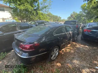2013 Volkswagen CC Sport with VIN WVWBP7AN3DE504851, listed as a Copart auction lot 54958815 with 104,533 mi miles and Salvage Title. Bid and sale history available at carsss.com. Image 4.