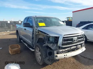 2012 Toyota Tundra z VIN 5TFRM5F14CX037380, wystawiony jako IAAI lot #41683381 z przebiegiem 218 413 mil mil oraz . Historia ofert i sprzedaży dostępna na DreamBid. Obrazek 1.