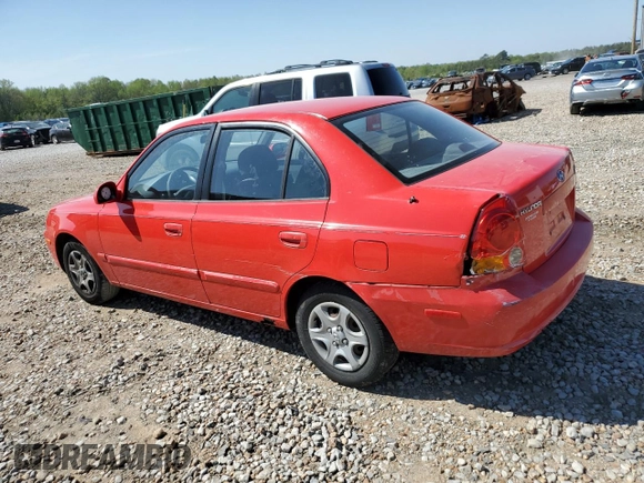 2005 Hyundai Accent GLS with VIN KMHCG45C15U592443, listed as a Copart auction lot 52291025 with 142,263 mi miles and Salvage Title. Bid and sale history available at carsss.com. Image 2.