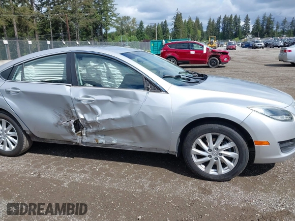 2012 Mazda 6 i Touring with VIN 1YVHZ8DH9C5M34135, listed as a IAAI auction lot 42306240 with 122,709 mi miles and . Bid and sale history available at DreamBid. Image 14.