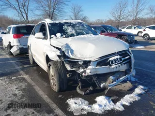 2017 Audi Q3 Premium with VIN WA1ECCFS9HR017842, listed as a IAAI auction lot 41400330 with 106,884 mi miles. Bid and sale history available at carsss.com. Image 1.