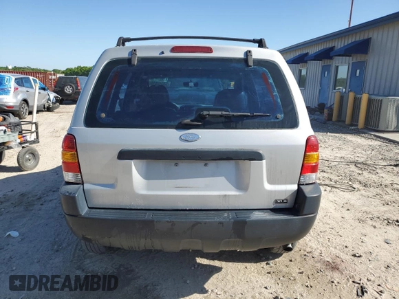 2002 Ford Escape XLS Choice with VIN 1FMYU01142KD48997, listed as a Copart auction lot 53340815 with 172,235 mi miles and Salvage title. Bid and sale history available at DreamBid. Image 6.