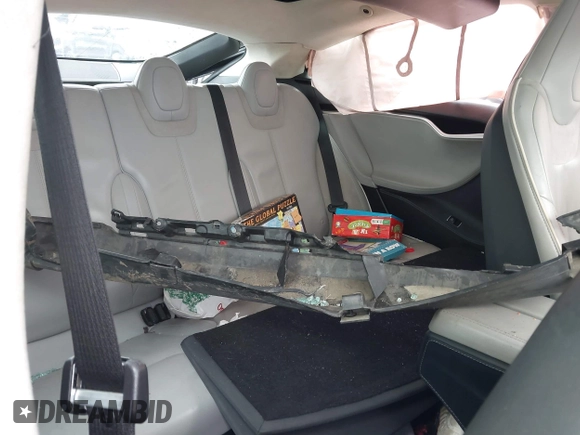 2014 Tesla Model S 60 with VIN 5YJSA1H18EFP30143, listed as a IAAI auction lot 42190505 with Not provided miles and . Bid and sale history available at DreamBid. Image 8.