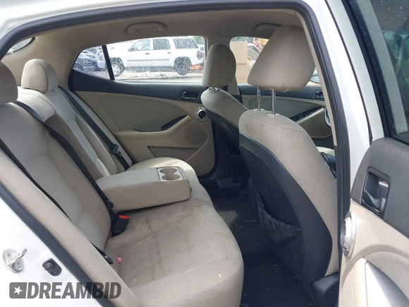 2014 Kia Optima LX with VIN 5XXGM4A73EG322529, listed as a IAAI auction lot 42610691 with 149,546 mi miles and . Bid and sale history available at DreamBid. Image 8.