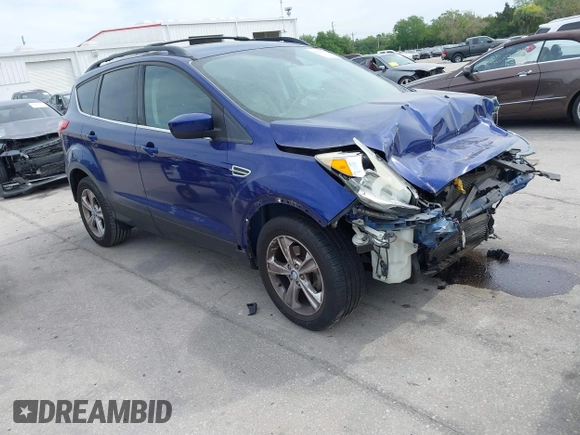 2013 Ford Escape SE with VIN 1FMCU0GXXDUB85818, listed as a IAAI auction lot 41848033 with 128,638 mi miles and . Bid and sale history available at DreamBid. Image 1.