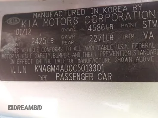 2012 Kia Optima Hybrid with VIN KNAGM4AD0C5013301, listed as a IAAI auction lot 41671259 with 270,757 mi miles. Bid and sale history available at carsss.com. Image 9.