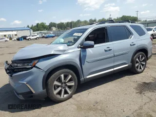 2024 Honda Pilot Touring with VIN 5FNYG1H71RB006233, listed as a Copart auction lot 62169425 with 27,799 mi miles and Salvage title. Bid and sale history available at DreamBid. Image 1.