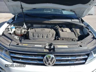 2021 Volkswagen Tiguan SE with VIN 3VV3B7AX9MM051920, listed as a IAAI auction lot 41826721 with 127,699 mi miles and . Bid and sale history available at DreamBid. Image 10.