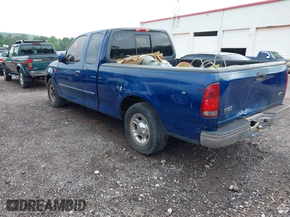 2002 Ford F-150 XL with VIN 1FTRX17W12NC06310, listed as a IAAI auction lot 42160213 with Not provided miles and . Bid and sale history available at DreamBid. Image 3.