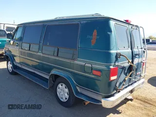 1994 GMC Vandura z VIN 1GDEG25K4RF523356, wystawiony jako IAAI lot #41854612 z przebiegiem 187 013 mil mil oraz . Historia ofert i sprzedaży dostępna na DreamBid. Obrazek 3.