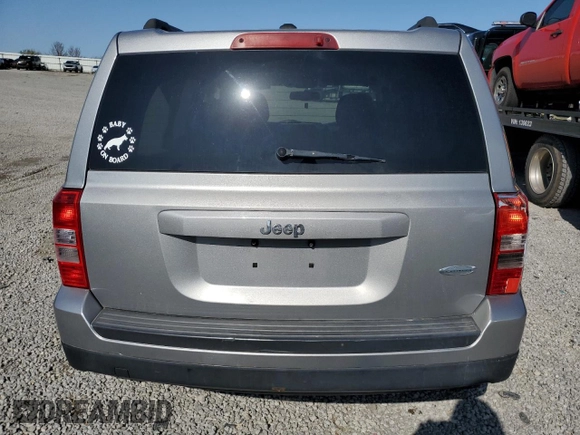 2015 Jeep Patriot Latitude with VIN 1C4NJPFB1FD157025, listed as a Copart auction lot 52310155 with 132,752 mi miles and Salvage title. Bid and sale history available at DreamBid. Image 6.