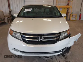 2015 Honda Odyssey Touring Elite with VIN 5FNRL5H97FB060060, listed as a IAAI auction lot 41829864 with Not Provided miles and . Bid and sale history available at DreamBid. Image 11.