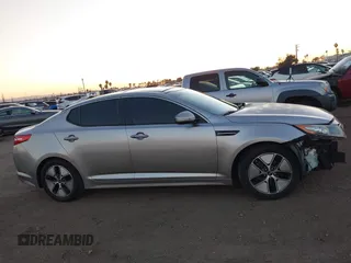 2012 Kia Optima Hybrid with VIN KNAGM4AD0C5016344, listed as a IAAI auction lot 41609544 with 149,986 mi miles. Bid and sale history available at carsss.com. Image 14.