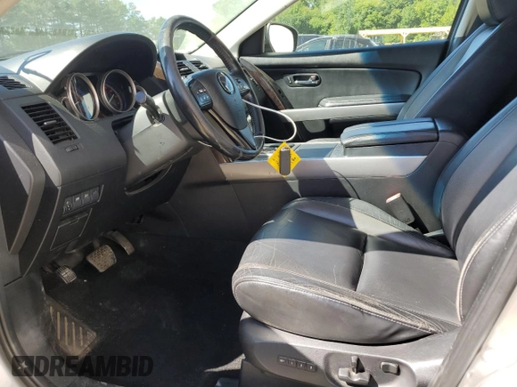 2012 Mazda CX-9 Grand Touring z VIN JM3TB3DV3C0335330, wystawiony jako Copart lot #57562015 z przebiegiem 171 397 mil mil oraz Szkoda całkowita • Salvage title. Historia ofert i sprzedaży dostępna na DreamBid. Obrazek 7.