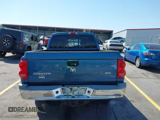 2005 Dodge Dakota SLT with VIN 1D7HW48N05S319621, listed as a IAAI auction lot 42037140 with 251,595 mi miles and . Bid and sale history available at DreamBid. Image 16.
