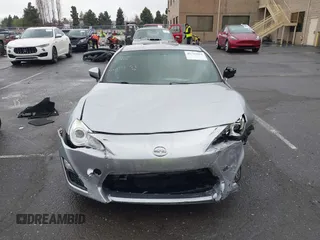 2016 Scion FR-S with VIN JF1ZNAA1XG8709798, listed as a IAAI auction lot 41713314 with 139,450 mi miles. Bid and sale history available at carsss.com. Image 13.