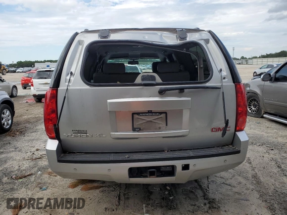 2014 GMC Yukon XL SLT with VIN 1GKS1KE03ER234487, listed as a Copart auction lot 74897284 with 198,965 mi miles and Salvage Title. Bid and sale history available at carsss.com. Image 6.