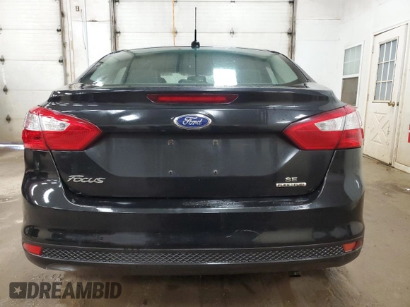 2013 Ford Focus SE z VIN 1FADP3F27DL226263, wystawiony jako Copart lot #53881835 z przebiegiem 176 185 mil mil oraz Czysty tytuł • Clean title. Historia ofert i sprzedaży dostępna na DreamBid. Obrazek 6.