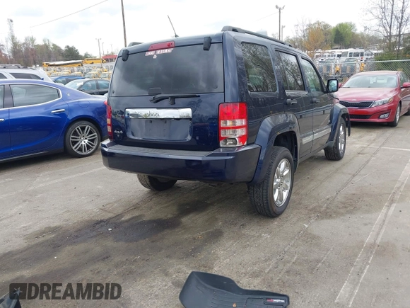 2012 Jeep Liberty Sport with VIN 1C4PJMAK2CW210975, listed as a IAAI auction lot 41904478 with 136,462 mi miles. Bid and sale history available at carsss.com. Image 4.