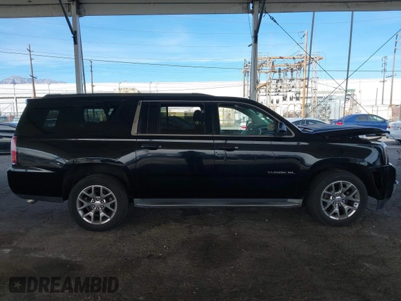 2016 GMC Yukon XL SLE with VIN 1GKS1FKC2GR147222, listed as a IAAI auction lot 41390201 with 86,385 mi miles. Bid and sale history available at carsss.com. Image 13.