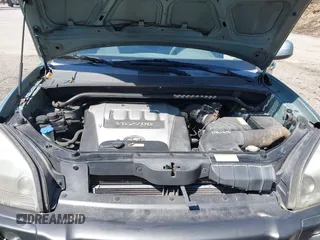 2006 Hyundai Tucson GLS with VIN KM8JN12D06U285856, listed as a IAAI auction lot 42112640 with 157,016 mi miles. Bid and sale history available at carsss.com. Image 10.