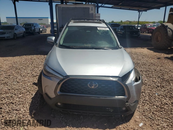 2023 Toyota Corolla Cross XLE with VIN 7MUDAAAG2PV050945, listed as a Copart auction lot 62237465 with 33,036 mi miles and Salvage title. Bid and sale history available at DreamBid. Image 5.