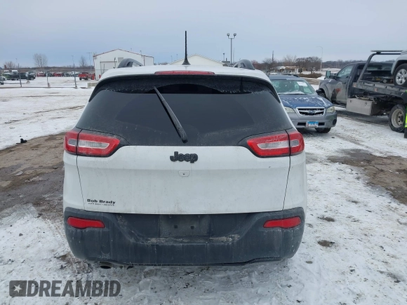 2016 Jeep Cherokee Altitude with VIN 1C4PJLAB4GW376723, listed as a IAAI auction lot 41593248 with 96,940 mi miles and . Bid and sale history available at DreamBid. Image 16.