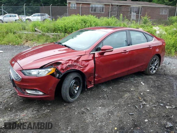 2017 Ford Fusion SE with VIN 3FA6P0H74HR197800, listed as a Copart auction lot 61042735 with 128,125 mi miles and Salvage title. Bid and sale history available at DreamBid. Image 1.